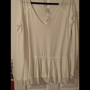 Free people white tunic top. Ruffled bottom L NWT